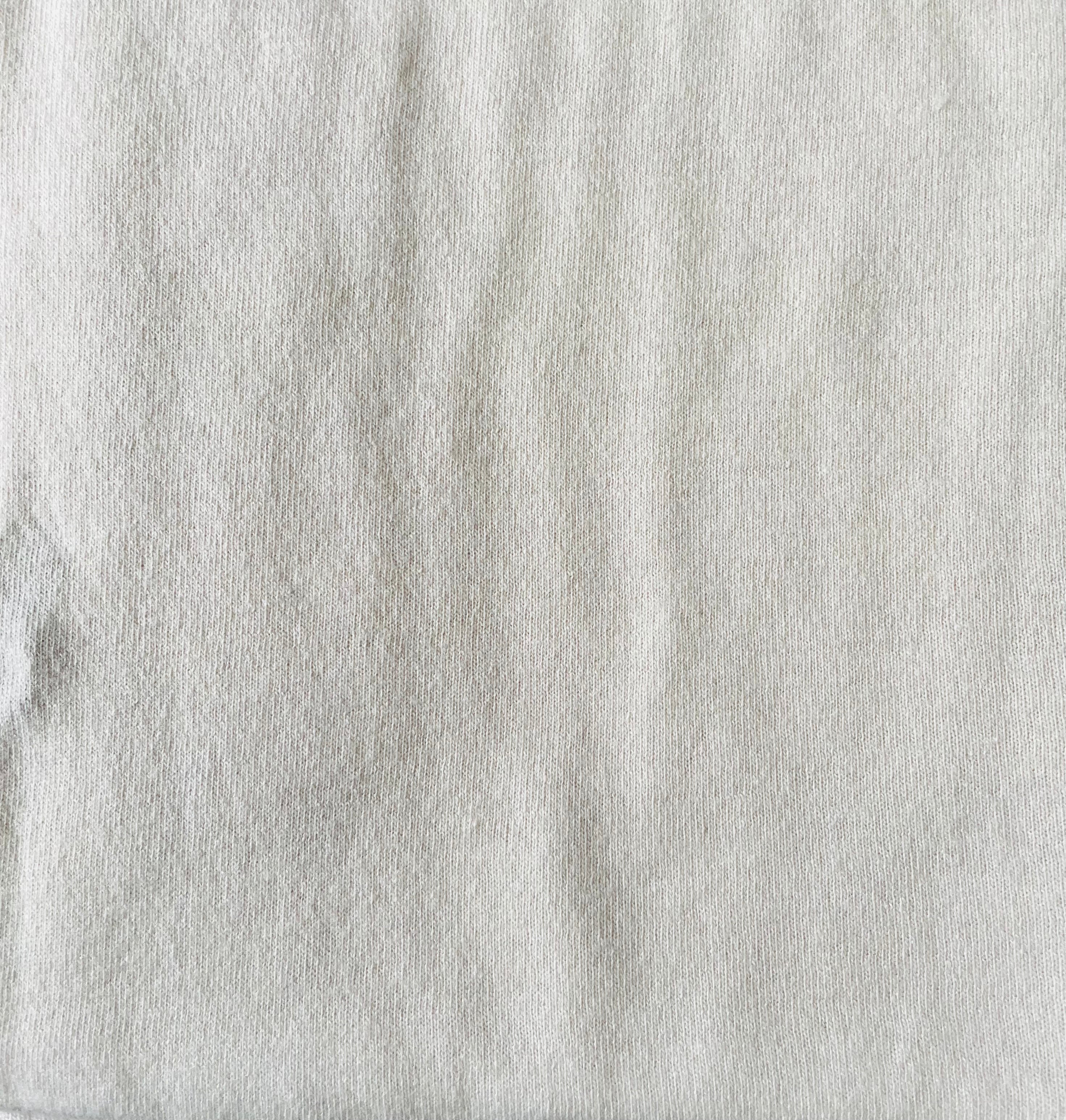 Poncho blanco roto 2
